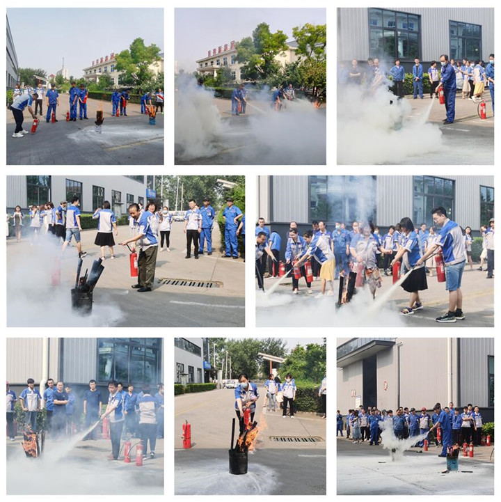 公司員工輪番上場,親身體驗了滅火器的正確使用方法 公司員工輪番上場,親身體驗了滅火器的正確使用方法